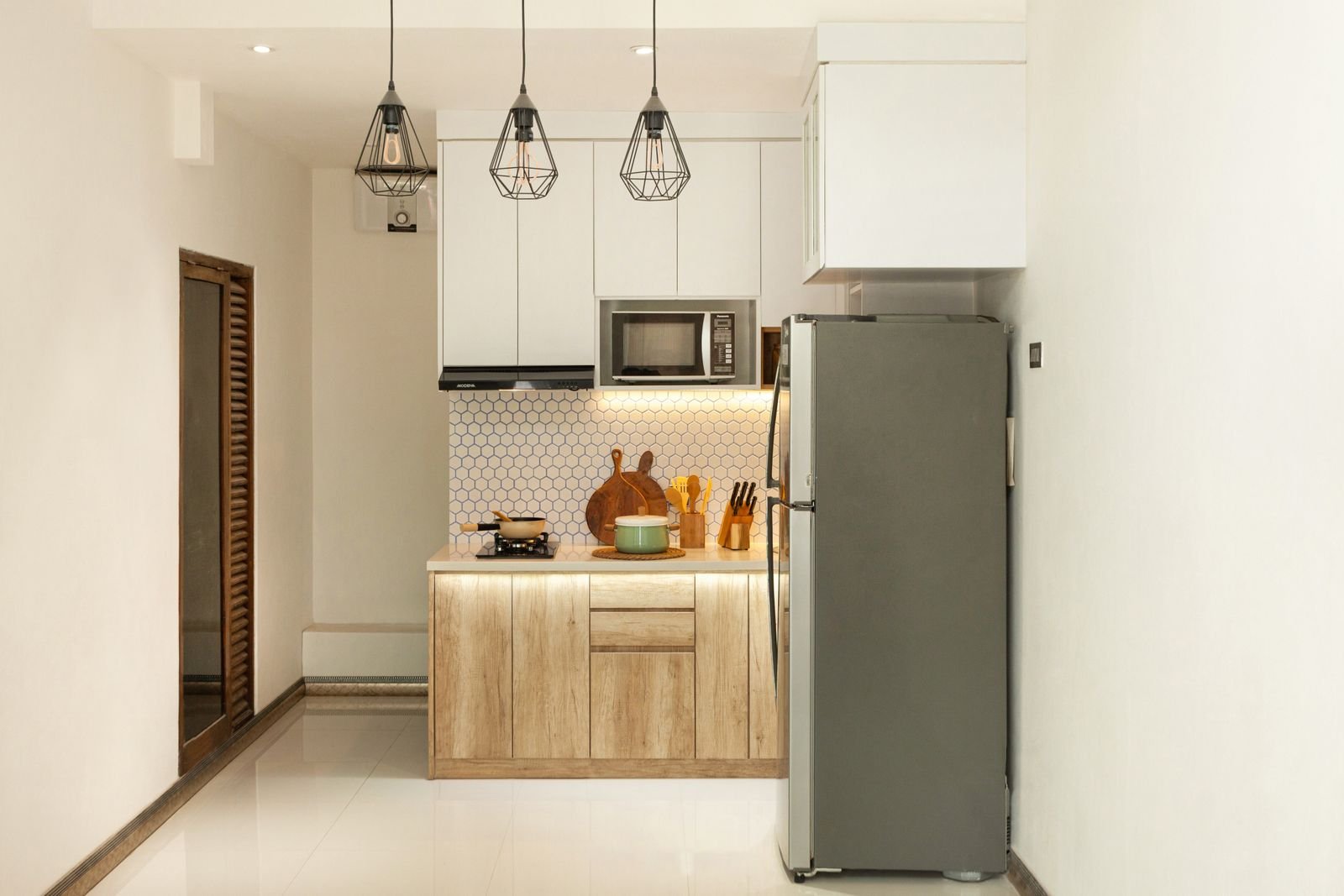 Compact modern kitchen with wooden cabinets